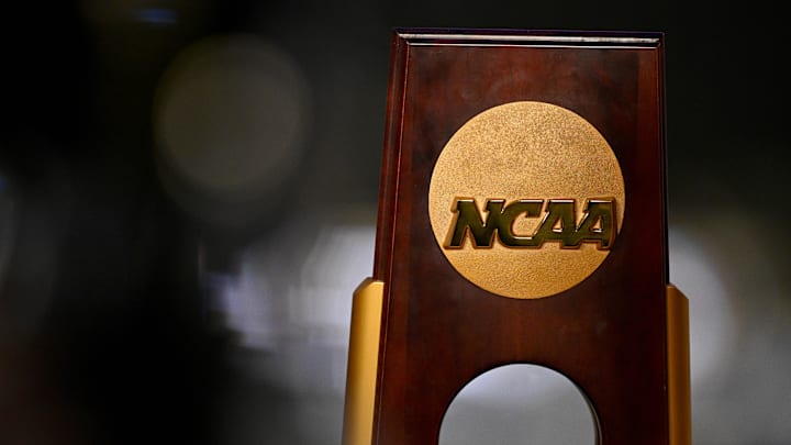 Apr 19, 2025; Fort Worth, TX, USA; A view of the NCAA logo and trophy before the 2025 Women's National Gymnastics Championship at Dickies Arena. Apr 19, 2025; Fort Worth, TX, USA; A view of the NCAA logo and trophy before the 2025 Women's National Gymnastics Championship at Dickies Arena.