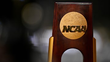 Apr 19, 2025; Fort Worth, TX, USA; A view of the NCAA logo and trophy before the 2025 Women's National Gymnastics Championship at Dickies Arena. Mandatory Credit: Jerome Miron-Imagn Images