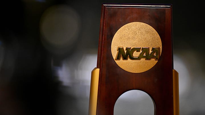 Apr 19, 2025; Fort Worth, TX, USA; A view of the NCAA logo and trophy before the 2025 Women's National Gymnastics Championship at Dickies Arena. Mandatory Credit: Jerome Miron-Imagn Images