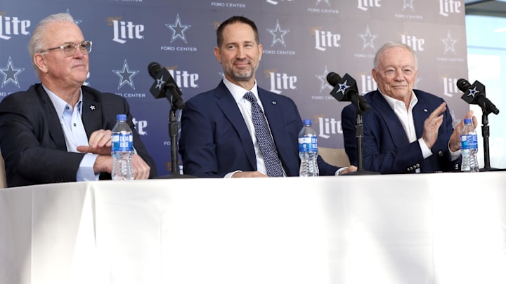 Dallas Cowboys CEO Stephen Jones, head coach Brian Schottenheimer, and owner Jerry Jones speak to the media at a press conference at the Star. Dallas Cowboys CEO Stephen Jones, head coach Brian Schottenheimer, and owner Jerry Jones speak to the media at a press conference at the Star.