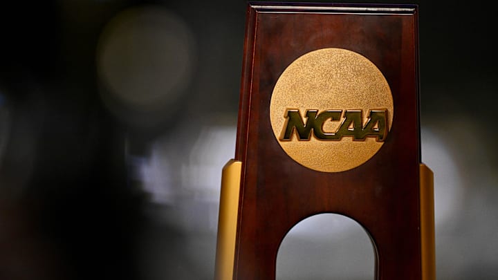 Apr 19, 2025; Fort Worth, TX, USA; A view of the NCAA logo and trophy before the 2025 Women's National Gymnastics Championship at Dickies Arena. Mandatory Credit: Jerome Miron-Imagn Images