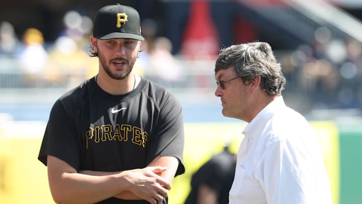 Sep 17, 2025; Pittsburgh, Pennsylvania, USA;  Pittsburgh Pirates pitcher Paul Skenes (30) talks with Pirates owner Robert Nutting (right) before the game against the Chicago Cubs at PNC Park. Mandatory Credit: Charles LeClaire-Imagn Images