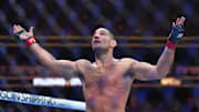 Jun 1, 2024; Newark, New Jersey, USA; Sean Strickland (red gloves)celebrates defeating Paulo Costa (blue gloves) during UFC 302 at Prudential Center. Mandatory Credit: Joe Camporeale-Imagn Images