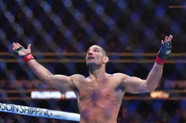 Sean Strickland celebrates defeating Paulo Costa during UFC 302 at Prudential Center. 