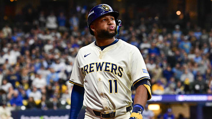 Oct 14, 2025; Milwaukee, Wisconsin, USA; Milwaukee Brewers right fielder Jackson Chourio (11) reacts to striking out against the Los Angeles Dodgers in the fifth inning during game two of the NLCS round for the 2025 MLB playoffs at American Family Field.