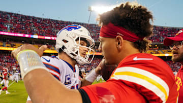 Oct 16, 2022; Kansas City, Missouri, USA; Buffalo Bills quarterback Josh Allen (17) hugs Kansas City Chiefs quarterback Patrick Mahomes (15) after a game at GEHA Field at Arrowhead Stadium. Mandatory Credit: Jay Biggerstaff-Imagn Images