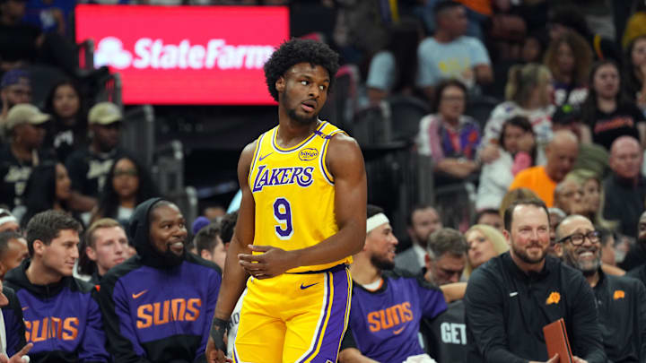 Oct 17, 2024; Phoenix, Arizona, USA; Los Angeles Lakers guard Bronny James (9) in action against the Phoenix Suns during the second half at Footprint Center. Mandatory Credit: Joe Camporeale-Imagn Images