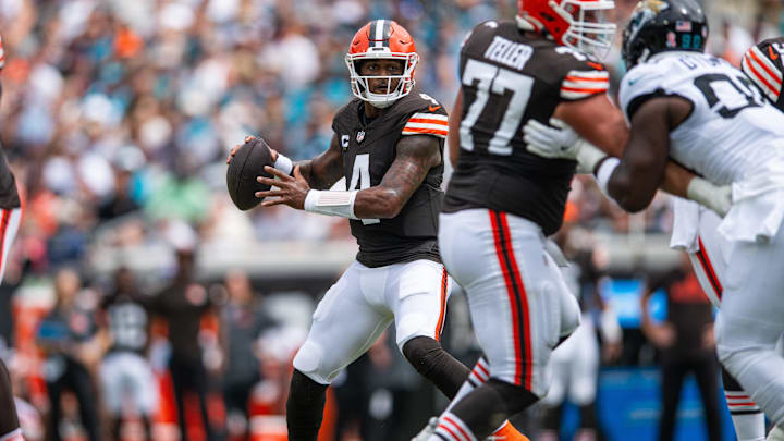 Sep 15, 2024; Jacksonville, Florida, USA; Cleveland Browns quarterback Deshaun Watson (4) drops to throws against the Jacksonville Jaguars in the first quarter at EverBank Stadium. Mandatory Credit: Jeremy Reper-Imagn Images