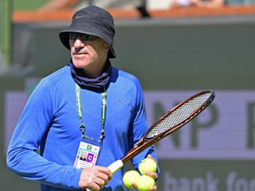 Mar 5, 2024; Indian Wells, CA, USA;  Tennis coach Brad Gilbert looks on during a practice for Coco Gauff (not pictured) during the BNP Paribas Open at the Indian Wells Tennis Garden. Mandatory Credit: Jayne Kamin-Oncea-Imagn Images