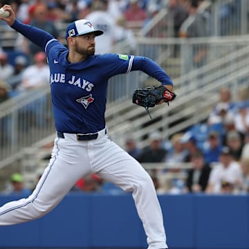 Dunedin, Florida, USA; Toronto Blue Jays pitcher Zach Pop (56) throws a pitch against the New York Yankees during the fourth inning  at TD Ballpark.