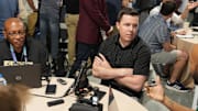 Apr 1, 2025; Palm Beach, FL, USA;  New Orleans Saints head coach Kellen Moore answers questions from the media during the NFL Annual League Meeting at The Breakers. Mandatory Credit: Jim Rassol-Imagn Images