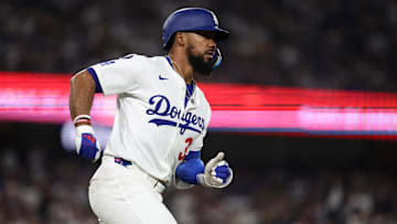 Apr 11, 2025; Los Angeles, California, USA; Los Angeles Dodgers outfielder Teoscar Hernandez (37) singles during the sixth inning against the Chicago Cubs at Dodger Stadium. Mandatory Credit: Kiyoshi Mio-Imagn Images