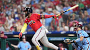 Aug 28, 2025; Philadelphia, Pennsylvania, USA; Atlanta Braves designated hitter Marcell Ozuna (20) hits a single against the Philadelphia Phillies in the seventh inning at Citizens Bank Park. Mandatory Credit: Kyle Ross-Imagn Images