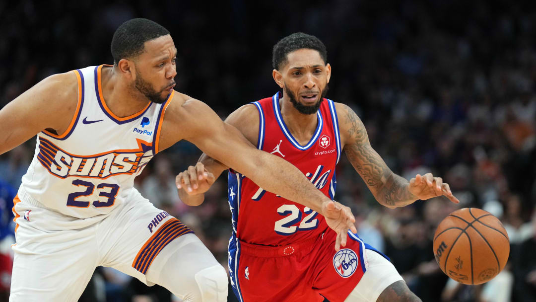 Mar 20, 2024; Phoenix, Arizona, USA; Phoenix Suns guard Eric Gordon (23) guards Philadelphia 76ers guard Cameron Payne (22) during the second half at Footprint Center. Mandatory Credit: Joe Camporeale-USA TODAY Sports