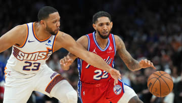 Mar 20, 2024; Phoenix, Arizona, USA; Phoenix Suns guard Eric Gordon (23) guards Philadelphia 76ers guard Cameron Payne (22) during the second half at Footprint Center. Mandatory Credit: Joe Camporeale-USA TODAY Sports