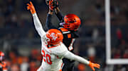 Nov 8, 2025; Corvallis, Oregon, USA; Oregon State Beavers wide receiver David Wells Jr. (1) makes a catch on the sideline with Sam Houston Bearkats defensive back Dravon Wilson (20) defending during the second half at Reser Stadium. Mandatory Credit: Craig Strobeck-Imagn Images