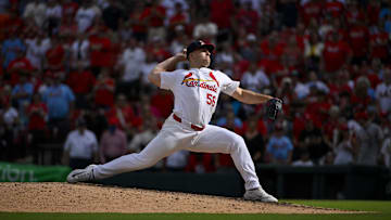 Sep 22, 2024; St. Louis, Missouri, USA; St. Louis Cardinals relief pitcher Ryan Helsley (56) pitches against the Cleveland Guardians during the ninth inning at Busch Stadium. Mandatory Credit: Jeff Curry-Imagn Images