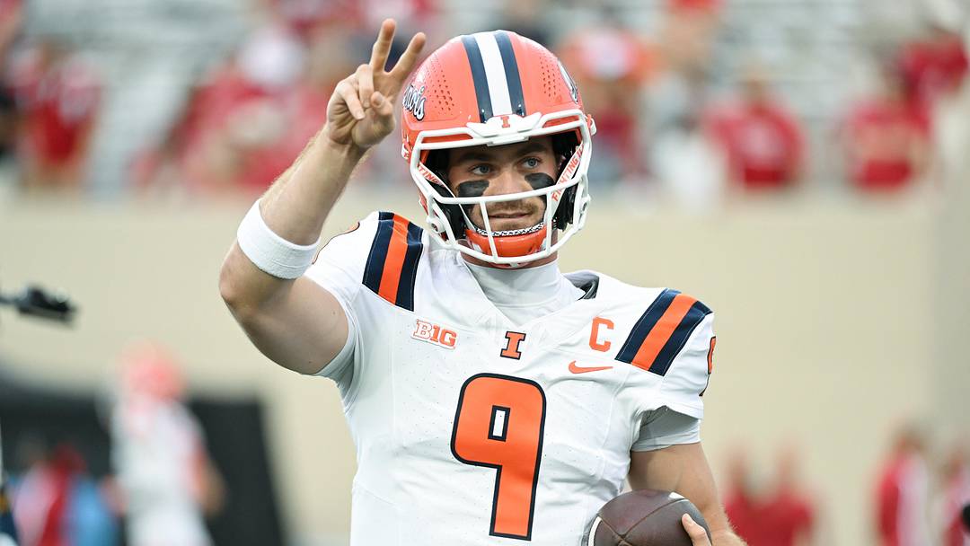 Sep 20, 2025; Bloomington, Indiana, USA; Illinois Fighting Illini quarterback Luke Altmyer (9) warms up prior to the game against the Indiana Hoosiers at Memorial Stadium. Mandatory Credit: Robert Goddin-Imagn Images