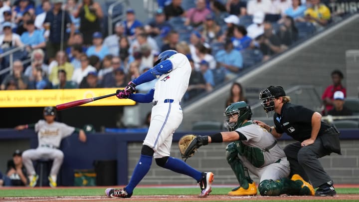 Toronto Blue Jays right fielder George Springer (4) hits a home run against the Oakland Athletics during the first inning at Rogers Centre on Aug 9.