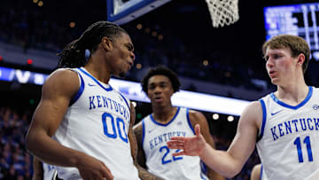 Feb 19, 2025; Lexington, Kentucky, USA; Kentucky Wildcats guard Otega Oweh (00) celebrates with guard Travis Perry (11) after blocking a shot by the Vanderbilt Commodores during the first half at Rupp Arena at Central Bank Center. Mandatory Credit: Jordan Prather-Imagn Images
