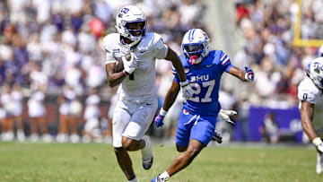 Sep 20, 2025; Fort Worth, Texas, USA; TCU Horned Frogs wide receiver Eric McAlister (1) runs with the ball during the game between the TCU Horned Frogs and the SMU Mustangs at Amon G. Carter Stadium. Mandatory Credit: Jerome Miron-Imagn Images