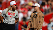 Aug 23, 2025; Santa Clara, California, USA; San Francisco 49ers tight end George Kittle (85), left, and running back Christian McCaffrey (23) before a game against the Los Angeles Chargers at Levi's Stadium. Mandatory Credit: Sergio Estrada-Imagn Images