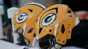 Helmets are shown during the fourth quarter of their preseason game Saturday, August 23, 2025 at Lambeau Field in Green Bay, Wisconsin. The Green Bay Packers beat the Seattle Seahawks 20-7.