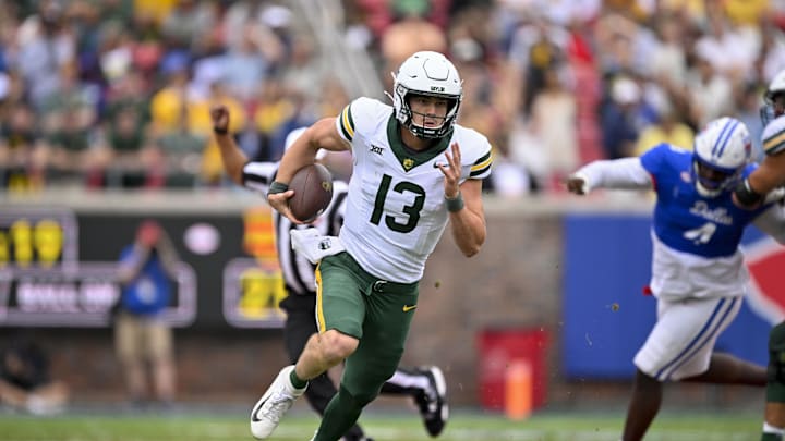 Baylor Bears quarterback Sawyer Robertson (13) runs with the ball during the game between the SMU Mustangs and the Baylor Bears at Gerald J. Ford Stadium