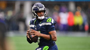Dec 22, 2024; Seattle, Washington, USA; Seattle Seahawks quarterback Geno Smith (7) during warmups before the game against the Minnesota Vikings at Lumen Field. Mandatory Credit: Steven Bisig-Imagn Images