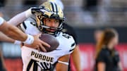 Purdue Boilermakers running back Devin Mockobee (45) takes a handoff