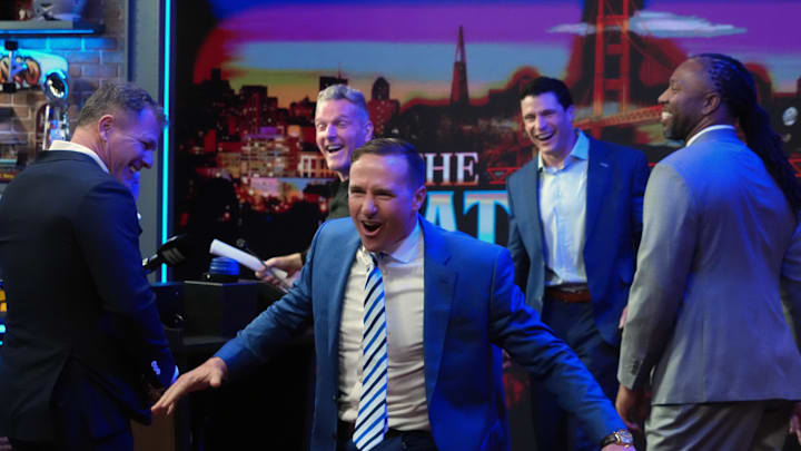 Pat McAfee (center) interacts with Pro Football Hall of Game Class of 2026 members Luke Kuechly, Drew Brees, Larry Fitzgerald and Adam Vinatieri 