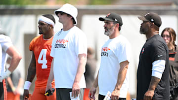 Aug 4, 2024; Cleveland Browns quarterback Deshaun Watson (4) and offensive coordinator Ken Dorsey and head coach Kevin Stefanski and running backs coach Duce Staley during practice at the Browns training facility in Berea, Ohio. Mandatory Credit: Bob Donnan-Imagn Images