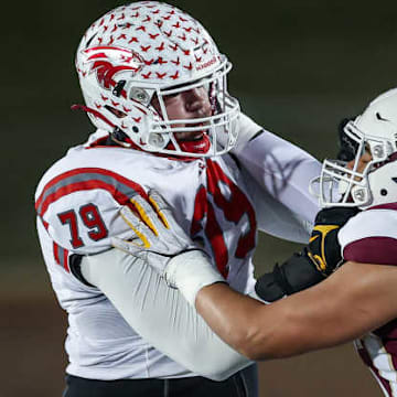 Nixa's Jackson Cantwell (79) blocks De Smet Jesuit's Titan Davis during the Missouri Class 6 Show-Me Bowl in 2024. Cantwell, a Miami Hurricanes commit, is rated the No. 1 2026 prospect in Missouri. Davis, a Michigan Wolverines commit, is rated No. 2.