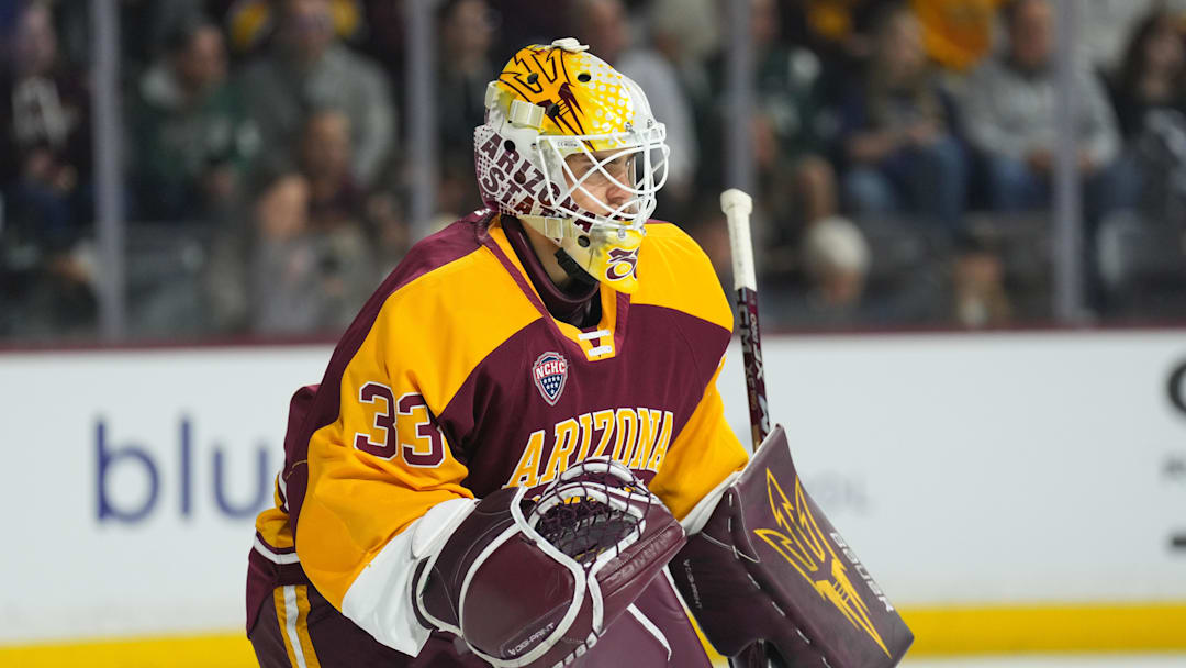 Oct 3, 2025; Tempe, AZ, USA; Arizona State Sun Devils goalie Connor Hasley (33) looks on against the Penn State Nittany Lions during the first period at Mullett Arena. 