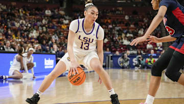 Mar 9, 2024; Greensville, SC, USA; LSU Lady Tigers guard Last-Tear Poa (13) handles the ball against the Ole Miss Rebels during the second half at Bon Secours Wellness Arena. Mandatory Credit: Jim Dedmon-Imagn Images