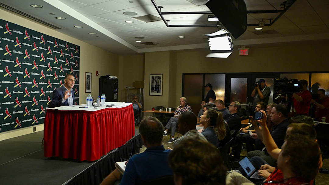 Aug 1, 2023; St. Louis, Missouri, USA; St. Louis Cardinals president of baseball operations John Mozeliak talks with the media after the Cardinals traded shortstop Paul DeJong (11) and starting pitcher Jack Flaherty (22) before a game against the Minnesota Twins at Busch Stadium. Mandatory Credit: Jeff Curry-Imagn Images Aug 1, 2023; St. Louis, Missouri, USA; St. Louis Cardinals president of baseball operations John Mozeliak talks with the media after the Cardinals traded shortstop Paul DeJong (11) and starting pitcher Jack Flaherty (22) before a game against the Minnesota Twins at Busch Stadium. Mandatory Credit: Jeff Curry-Imagn Images
