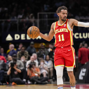 Apr 10, 2024; Atlanta, Georgia, USA; Atlanta Hawks guard Trae Young (11) points to a teammate against the Charlotte Hornets during the first half at State Farm Arena. Mandatory Credit: Dale Zanine-USA TODAY Sports