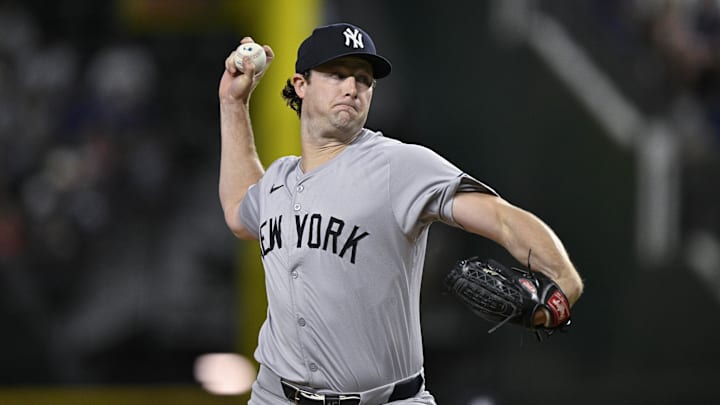 Sep 2, 2024; Arlington, Texas, USA; New York Yankees starting pitcher Gerrit Cole (45) pitches against the Texas Rangers during the first inning at Globe Life Field. Mandatory Credit: Jerome Miron-Imagn Images