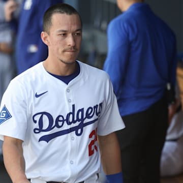 Apr 13, 2025; Los Angeles, California, USA; Los Angeles Dodgers outfielder Tommy Edman (25) looks on before the game against the Chicago Cubs at Dodger Stadium. Mandatory Credit: Kiyoshi Mio-Imagn Images
