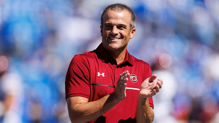 Sep 7, 2024; Lexington, Kentucky, USA; South Carolina Gamecocks head coach Shane Beamer claps during warm-ups before the game against the Kentucky Wildcats at Kroger Field. Mandatory Credit: Jordan Prather-Imagn Images