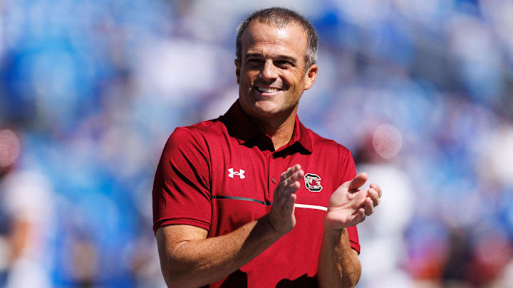 Sep 7, 2024; Lexington, Kentucky, USA; South Carolina Gamecocks head coach Shane Beamer claps during warm-ups before the game against the Kentucky Wildcats at Kroger Field. Mandatory Credit: Jordan Prather-Imagn Images