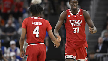 Texas Tech Red Raiders guard Christian Anderson high-fives forward Federiko Federiko 