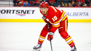 Oct 12, 2024; Calgary, Alberta, CAN; Calgary Flames center Jonathan Huberdeau (10) during the face off against the Philadelphia Flyers during the second period at Scotiabank Saddledome. Mandatory Credit: Sergei Belski-Imagn Images