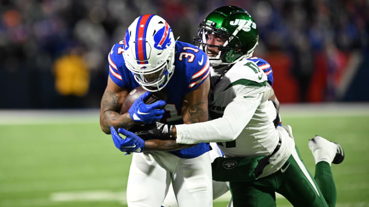 Nov 19, 2023; Orchard Park, NY; Buffalo Bills cornerback Rasul Douglas (31) intercepts a ball intended for New York Jets wide receiver Garrett Wilson (17) in the second quarter at Highmark Stadium. 