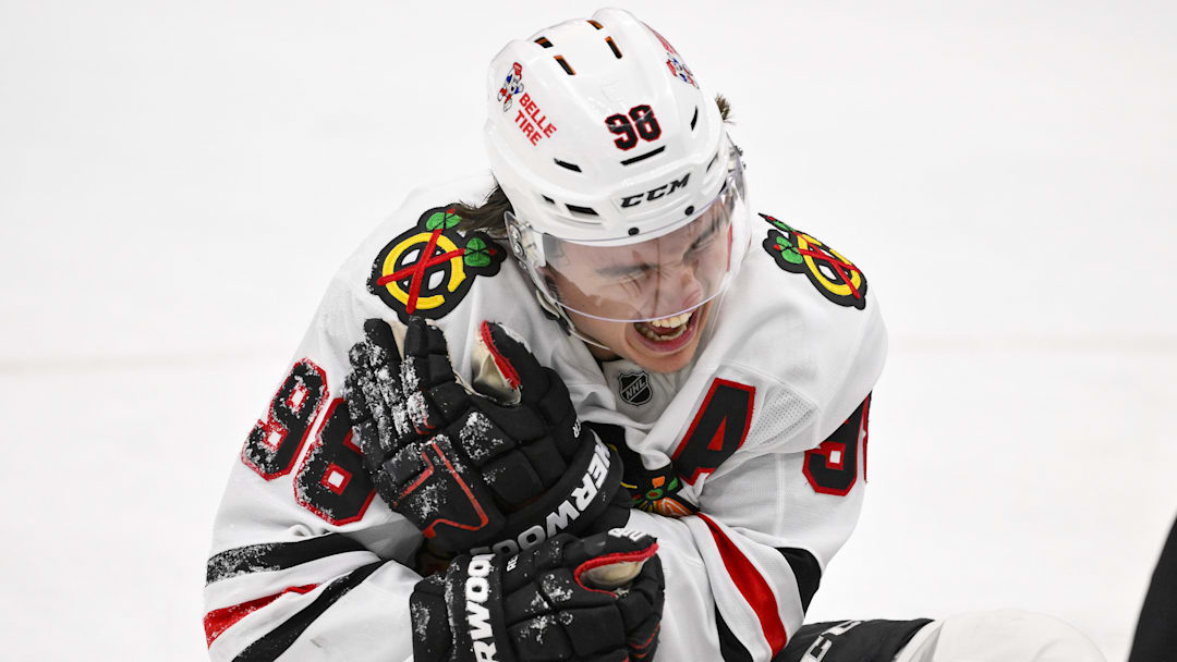 Dec 12, 2025; St. Louis, Missouri, USA; Chicago Blackhawks center Connor Bedard (98) reacts in pain after a face off against St. Louis Blues center Brayden Schenn (not pictured) during the third period at Enterprise Center. Mandatory Credit: Jeff Curry-Imagn Images