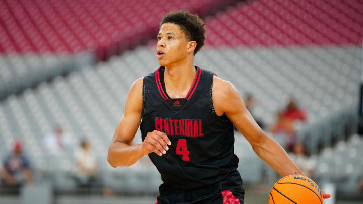 Corona Centennial wing Carter Bryant (4), a five-star commit to University of Arizona, dribbles against Corner Canyon during the Section 7 Basketball Tournament at State Farm Stadium in Glendale on June 23, 2023.