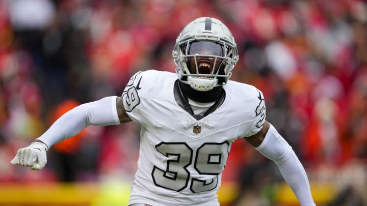 Dec 25, 2023; Kansas City, Missouri, USA; Las Vegas Raiders cornerback Nate Hobbs (39) celebrates during the first half against the Kansas City Chiefs at GEHA Field at Arrowhead Stadium. Mandatory Credit: Jay Biggerstaff-USA TODAY Sports