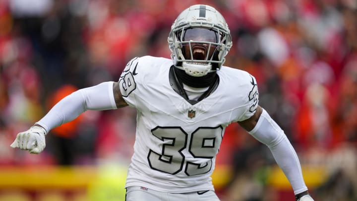 Dec 25, 2023; Kansas City, Missouri, USA; Las Vegas Raiders cornerback Nate Hobbs (39) celebrates during the first half against the Kansas City Chiefs at GEHA Field at Arrowhead Stadium. Mandatory Credit: Jay Biggerstaff-USA TODAY Sports