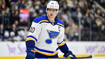 Jan 18, 2025; Salt Lake City, Utah, USA; St. Louis Blues center Brayden Schenn (10) before a face-off against the Utah Hockey Club during first period at the Delta Center. Mandatory Credit: Christopher Creveling-Imagn Images