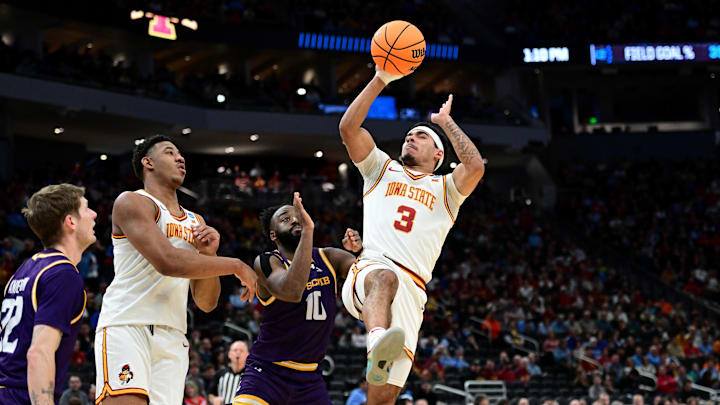 Mar 21, 2025; Milwaukee, WI, USA; Iowa State Cyclones guard Tamin Lipsey (3) shoots against Lipscomb Bisons guard Gyasi Powell (10) during the first half of a first round NCAA men’s tournament game at Fiserv Forum. Mandatory Credit: Benny Sieu-Imagn Images Mar 21, 2025; Milwaukee, WI, USA; Iowa State Cyclones guard Tamin Lipsey (3) shoots against Lipscomb Bisons guard Gyasi Powell (10) during the first half of a first round NCAA men’s tournament game at Fiserv Forum. Mandatory Credit: Benny Sieu-Imagn Images